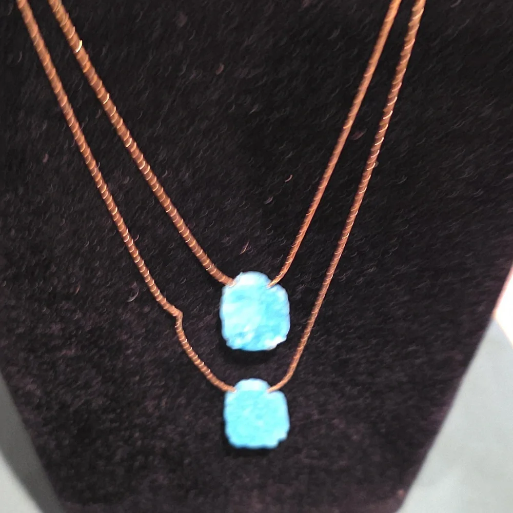 Gold Necklace with Blue Stone Accents